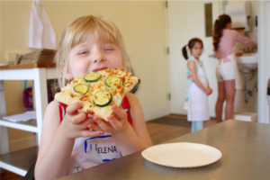 Girl Eating Flatbread 300x200